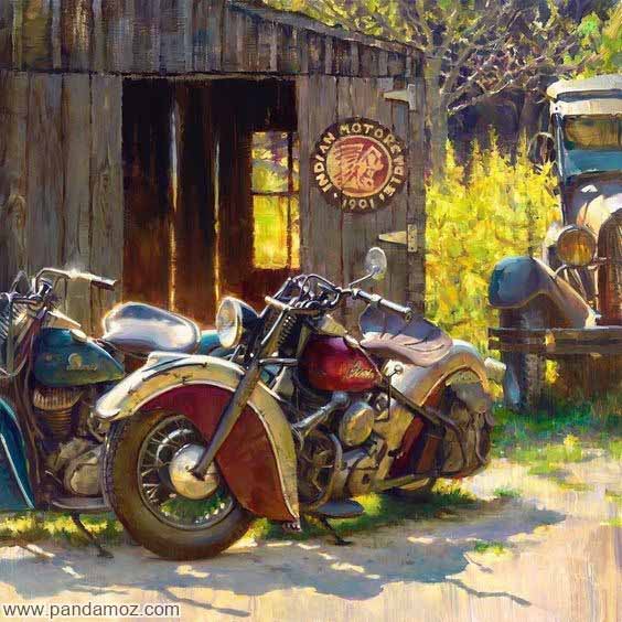 عکس تابلو نقاشی از یک گاراژ یا تعمیرگاه قدیمی هندی با دیوارهای چوبی و تصویر دو موتورسیکلت در مقابل آن. بخشی از یک ماشین قدیمی در گوشه تصویر دیده می شود